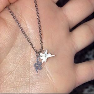 Rattle snake vertebrae necklace with snake charm